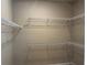 Walk-in closet with shelving at 13909 Kingfisher Glen Dr, Lithia, FL 33547