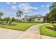 Charming community clubhouse with landscaping and inviting walkway at 12310 Stonelake Ranch Blvd, Thonotosassa, FL 33592
