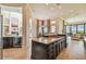 Large kitchen island, granite countertops and high-end stainless steel appliances at 12310 Stonelake Ranch Blvd, Thonotosassa, FL 33592