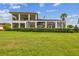 Expansive backyard with lush lawn and two-story home view at 12310 Stonelake Ranch Blvd, Thonotosassa, FL 33592