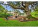 playground nestled under a large oak tree at 12310 Stonelake Ranch Blvd, Thonotosassa, FL 33592