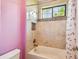 Tiled bathtub and shower with mosaic accents at 12310 Stonelake Ranch Blvd, Thonotosassa, FL 33592