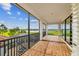 Screened balcony overlooking tranquil lake and golf course at 12310 Stonelake Ranch Blvd, Thonotosassa, FL 33592
