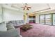 Spacious game room with balcony access and wet bar at 12310 Stonelake Ranch Blvd, Thonotosassa, FL 33592