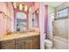 Bathroom with granite vanity, tiled shower, and bathtub at 12310 Stonelake Ranch Blvd, Thonotosassa, FL 33592