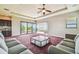 Game room with balcony access and seating area at 12310 Stonelake Ranch Blvd, Thonotosassa, FL 33592