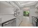 Modern kitchen with stainless steel appliances and white cabinets at 12411 Titus Ct # 12411, Tampa, FL 33612
