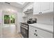 Modern kitchen with stainless steel appliances and white cabinets at 12411 Titus Ct # 12411, Tampa, FL 33612