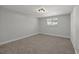 Simple bedroom with neutral walls and plush carpeting at 12411 Titus Ct # 12411, Tampa, FL 33612