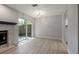 Bright dining room with fireplace and sliding glass doors leading to patio at 12411 Titus Ct # 12411, Tampa, FL 33612