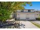 Two-story home with attached garage and driveway at 12411 Titus Ct # 12411, Tampa, FL 33612