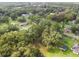 Aerial view of property, highlighting its location near other houses and trees at 7207 Westinghouse Ave, Tampa, FL 33619