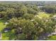 Aerial view of lot, highlighting its position near houses and green space at 7207 Westinghouse Ave, Tampa, FL 33619