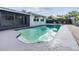 Inviting swimming pool with ample deck space at 5610 Dolores Dr, Holiday, FL 34690