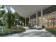 Luxury building entrance with porte cochere and landscaping at 3015 S Ysabella Ave # 2103, Tampa, FL 33629