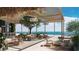 Oceanfront lounge area with pergola and bar at 3015 S Ysabella Ave # 701, Tampa, FL 33629