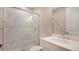 Bathroom with quartz countertop and walk-in shower at 12706 Palatka Dr, Venice, FL 34293