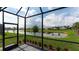 Relaxing screened patio overlooking a lake at 12706 Palatka Dr, Venice, FL 34293