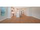 Open concept kitchen with white cabinets and island at 12706 Palatka Dr, Venice, FL 34293