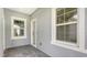 Light gray entryway with tile flooring and neutral tones at 12706 Palatka Dr, Venice, FL 34293