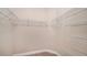 Walk-in closet with wire shelving and hanging rods at 12706 Palatka Dr, Venice, FL 34293