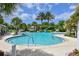 Inviting community pool with a waterslide, perfect for Gathering fun at 12706 Palatka Dr, Venice, FL 34293