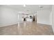 Open concept dining area with view into the kitchen at 12737 Wanderlust Pl, Parrish, FL 34219