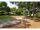 Cleared lot with mature trees, partially shaded at 7813 Valrie Ln, Riverview, FL 33569
