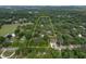 Aerial view of property showcasing large lot size and surrounding trees at 7813 Valrie Ln, Riverview, FL 33569