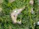 Aerial view of a land lot surrounded by lush greenery at 7813 Valrie Ln, Riverview, FL 33569