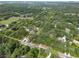 Aerial view showing property boundaries and surrounding landscape at 7813 Valrie Ln, Riverview, FL 33569