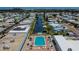 Aerial view showing community pool and canal at 107 E Saint Johns Way, Apollo Beach, FL 33572