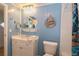 Bathroom with vanity, toilet and shower at 107 E Saint Johns Way, Apollo Beach, FL 33572
