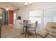 Small dining area with table and chairs adjacent to the kitchen at 107 E Saint Johns Way, Apollo Beach, FL 33572