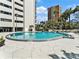 Inviting circular pool with surrounding patio furniture at 4141 Bayshore Blvd # 1203, Tampa, FL 33611