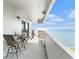 Spacious balcony overlooking the water with outdoor seating at 4141 Bayshore Blvd # 1203, Tampa, FL 33611
