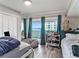 Bright bedroom with water views and a comfy beanbag chair at 4141 Bayshore Blvd # 1203, Tampa, FL 33611
