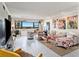 Bright living room with modern furniture and large windows at 4141 Bayshore Blvd # 1203, Tampa, FL 33611