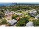 Aerial view showcasing a neighborhood near the waterfront at 401 Appian Ne Way, St Petersburg, FL 33704