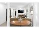 Elegant living room showcasing a round table and a comfortable sofa at 401 Appian Ne Way, St Petersburg, FL 33704