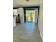 Bright dining area with sliding glass doors leading to backyard at 8353 Normandy Dr, Weeki Wachee, FL 34613
