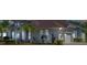 House exterior at night showcasing architectural details and landscaping at 6218 Bridleford Dr, Wesley Chapel, FL 33545