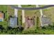Aerial view of neighborhood showing multiple houses, yards, and pools at 6218 Bridleford Dr, Wesley Chapel, FL 33545