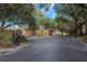 Gated community entrance with brick pillars and signage at 6218 Bridleford Dr, Wesley Chapel, FL 33545