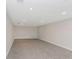 Large bonus room with grey carpet and recessed lighting at 6218 Bridleford Dr, Wesley Chapel, FL 33545