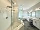 Large bathroom with a walk-in shower, soaking tub, and double vanity at 6218 Bridleford Dr, Wesley Chapel, FL 33545