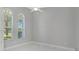 Bright office features gray walls, marble floors, and arched windows at 6218 Bridleford Dr, Wesley Chapel, FL 33545