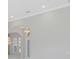 Bright living room with marble floors and elegant chandelier at 6218 Bridleford Dr, Wesley Chapel, FL 33545
