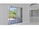 Living room with sliding glass doors leading to a lanai at 6218 Bridleford Dr, Wesley Chapel, FL 33545