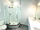 Modern bathroom with a glass shower and double vanity at 6218 Bridleford Dr, Wesley Chapel, FL 33545